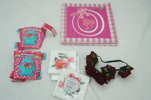 lot 109 image: Gift Boxes, Kids Knee Pads, Rose Headband