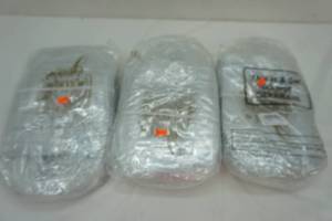 lot 263 image: Clear Plastic Thank You Bags wGold Writing