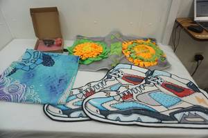 lot 444 image: Tennis Shoe Rugs (2ct) Silicone Bakeware, Sea Turtle Beach Blanket, Fleece Sensory Flower