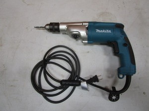 lot 61 image: Makita 12 Drill