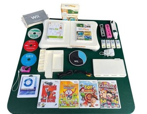lot 13 image: Nintendo Wii Games & Accessories Lot including Psyclone Charging Station, Wii Balance Board and More