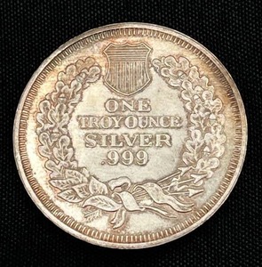lot 17 image: One Troy Ounce .999 Fine Silver Round Coin