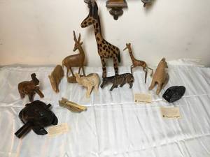 lot 142 image: Hand Carved Wooden figurines