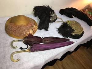 lot 124 image: Antique Hats and parasoles