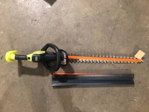 lot 20 image: RYOBI ONE HP 18V Brushless 24 in. Cordless Battery Hedge Trimmer (Tool Only)    Customer Returns See Pictures