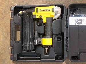 lot 24 image: DEWALT 18-Gauge Pneumatic Brad Nailer  Customer Returns See Pictures