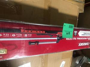lot 49 image: Husky 24 in. Tile Cutter with Tungsten Carbide Blade and Adjustable Gauge customer return see pictures