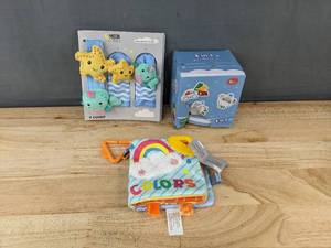 lot 293 image: Infant Toys Colors Cloth Book, Musical Toy Set, Hand and Foot Rattles - Brand New