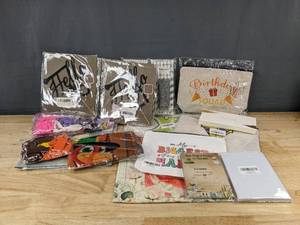 lot 185 image: Assorted Birthday and Holiday Party Decor, Signs, Banners, and Cosmetic Bags - Brand New B