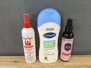 lot 227 image: Cetaphil Body Wash, Fairy Tales Conditioning Spray, and Hask Hair Leave-In Spray - Brand New