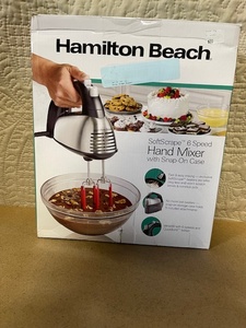 lot 136 image: Hamilton Beach SoftScrape 6-Speed Hand Mixer with Snap-On Case