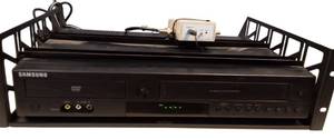 lot 24 image: Samsung -  DVD-V9800 Tunerless 1080p Upconverting VHS Combo DVD Player (2009 Model)