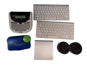 lot 29 image: Apple & Amazon lot - 2 Apple Keyboards, Apple Pad , 2 Amazon Alexas and Brother labeling na d Speaking Homework