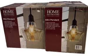 lot 63 image: Home Decorators Collection -  (2)  1 Light Mini Pendant Light Aged Bronze Amber Glass  Model 1002 438 184