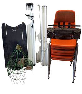 lot 109 image: Shop supplies lot includes overhead lights, a display sled, a wire basket, a vintage boom box, and chairs.