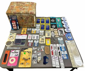 lot 012 image: Huge Vintage Singer sewing needle and more bundle patchwork-style fabric and storage box