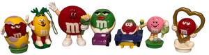 lot 198 image: Huge Bundle of M&Ms collectible figures and candy dispensersVintage cake toppers