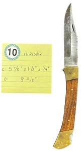 lot 410 image: Vintage Pakistan pocket knife open with brass and wood handle. Vintage folding pocket knife, open, with brass and wood handle, old blade