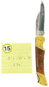 lot 415 image: Vintage Buck 110 Folding Hunter knife. It is a classic lock-back design