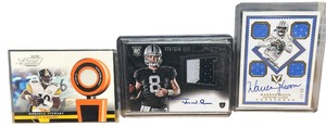 lot 082 image: Near mint Three Jersey signature material premiere sports cards