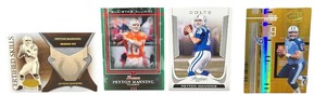 lot 106 image: RARE BUNDLE NEAR MINT Peyton Manning,Peyton Manning,Peyton Manning,Steve McNair Football Trading Cards