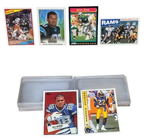 lot 108 image: RARE NEAR MINT HUGE BUNDLE Dez Bryant,Marcus Dupree,Eric Dickerson,Keith Byars,Donruss Gridiron Kings,Franco Harris Football trading Cards