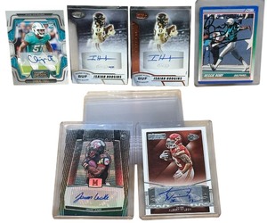 lot 114 image: HUGE RARE COLLECTIBLE SIGNED BUNDLE FOOTBALL CARDS,Javon Leake,Albert Wilson,Reggie Roby,Reggie Roby,2 Isaiah Hodgins,Channing Tindall