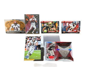 lot 134 image: HUGE NEAR MINT BUNDLE,Drew Lock,Drew Bennett,Brian Dawkins,Marques Colston,Tim Couch,Morlon Greenwood Football Cards