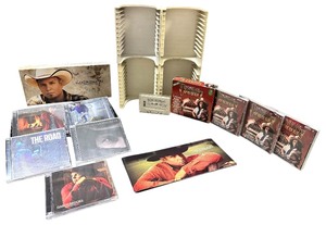lot 218 image: Vintage Garth Brooks CD SET with holder and Christmas vintage CDs