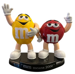 lot 190 image: Collectible collectible M&Ms candy dispenser featuring the yellow and red M&Ms characters