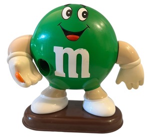 lot 185 image: Collectible dispenser featuring the green M&Ms character