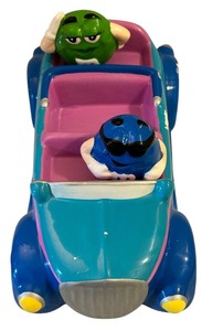 lot 182 image: Viintage M&Ms Galerie ceramic candy dish featuring the green and blue M&Ms characters in a blue sports car
