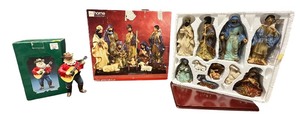 lot 494 image: JC Penney Home Collection Artisan Glazed Nativity SetKurt S. Adler Cowboy Santa Playing Guitar Ornament