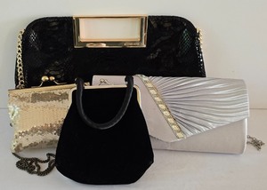 lot 153K image: ML-BR1 - Lot of 4 Designer Evening Bags Michael Kors, Silver Clutch, La Regale, and Kenneth Cole Unlisted