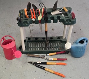 lot 220K image: G - Garden Tool Set with Watering Cans and Hand Tools on Organizer Rack