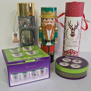 lot 231K image: G - Holiday Gift Set with Reindeer Mugs, Plates, and Festive Gift Tubes