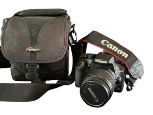 lot 34D image: K - Canon EOS Rebel XS DSLR Camera with 18-55mm Lens, Strap, and Lowepro Bag