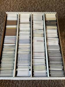 lot 132 image: Four Row Box of Baseball and Football Cards, Mix of Players, Years and Brands.