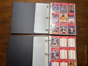 lot 225 image: 1990 Donruss Set of Baseball Cards, One Binder American League and One Binder National League