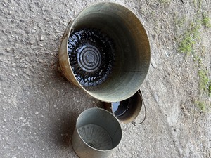 lot 47 image: Vintage bucket, pot , funnel and two roles of snow fence