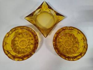 lot 84 image: Amber Glass Vintage Ashtrays