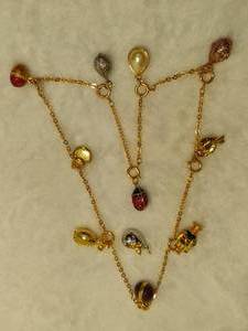 lot 77 image: Joan Rivers Faberge Egg & Assorted Charm Necklace