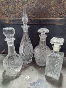 lot 110 image: Four GlassCrystal Decanters wLids