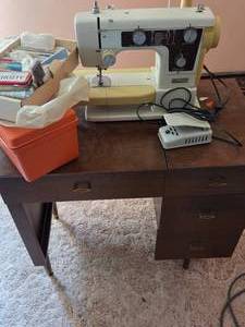 lot 108 image: New Home Sewing Machine & Cabinet