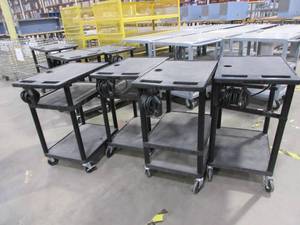 lot 331 image: LUXOR BLACK ROLLING CARTS WITH POWER STRIPS