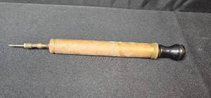 lot 95 image: Antique Brass Pump with Wood Handle