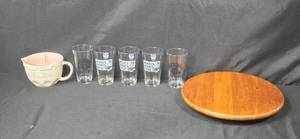 lot 143 image: Set of Logo Pint Timberwolves Glasses, Wood Lazy Susan, and VTG Ceramic Measuring Jug