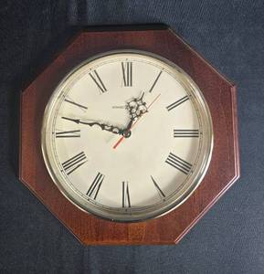 lot 157 image: Howard Miller Octagon Wall Clock with Roman Numerals