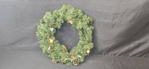 lot 180 image: Artificial Holiday Wreath with Hallmark Miniature Ornaments and Pinecone Accents