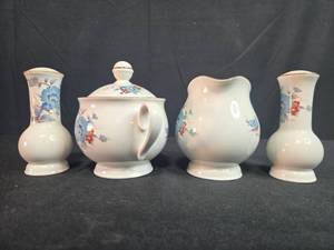 lot 218 image: Noritake Versatone Bleu Fleur Creamer Sugar Bowl and Shakers Set